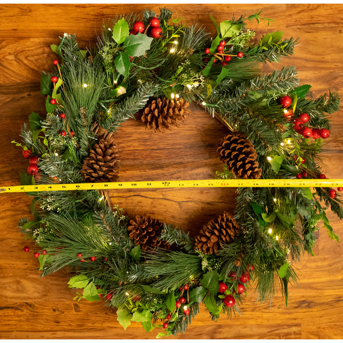 Red Co. Light-Up Christmas Spruce Wreath with Pinecones, Red Holly Berries and LED Lights, Solar Powered - 22 Inch